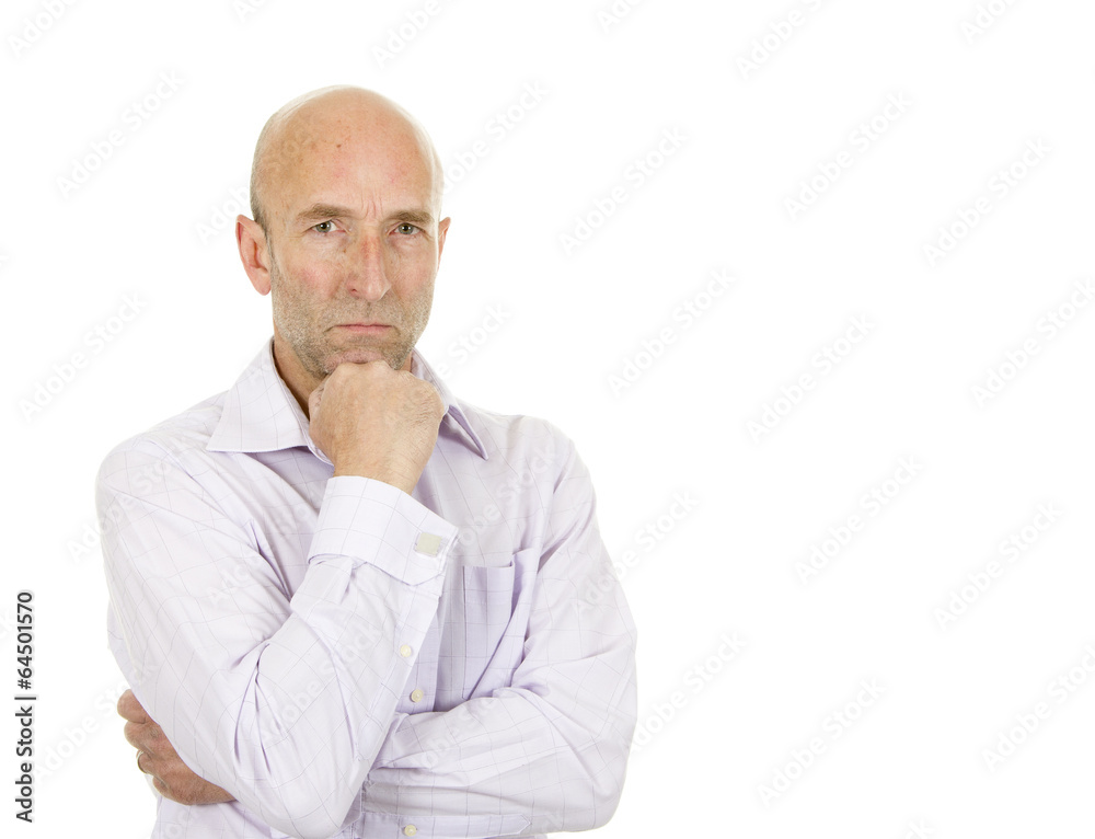 Man in pale shirt stood thinking Man in pale shirt stood thinking