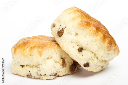 Two fruit scones on a white background photo