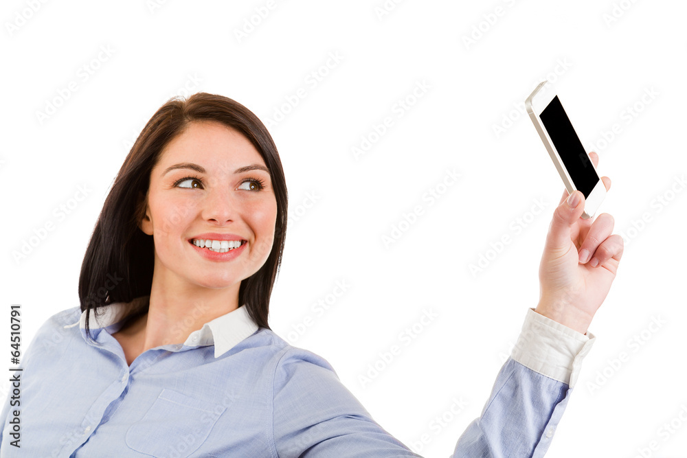 young smiling brunette woman taking a self portrait with her pho young smiling brunette woman taking a self portrait with her pho