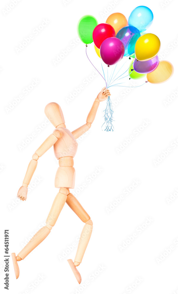 wooden Dummy holding flying balloons isolated wooden Dummy holding flying balloons isolated