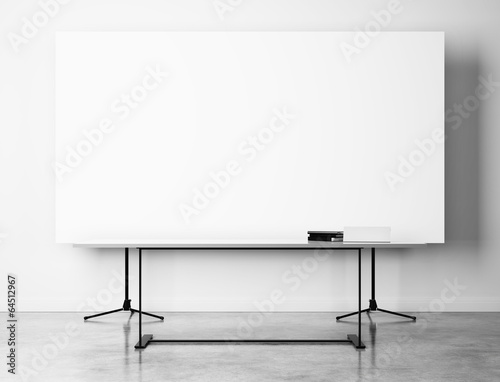 Office interior with blank flip chart photo