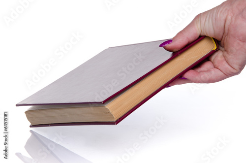Woman's hand giving a book