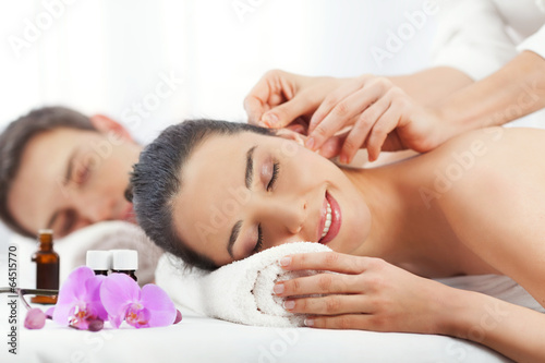 Couple having a spa treatment