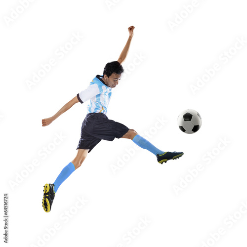Football player kicking ball isolated 1