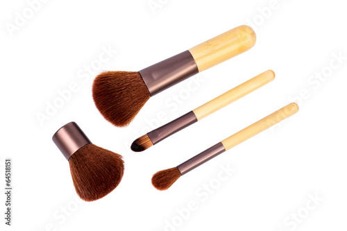 Wooden cosmetic brushes. Isolated