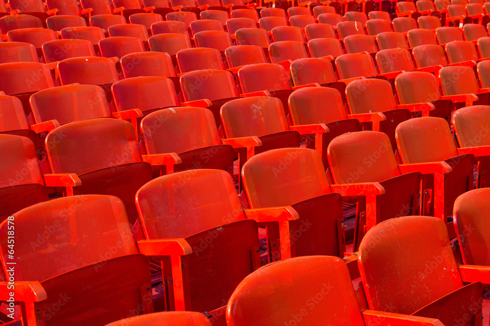Obraz premium Rows of red chairs