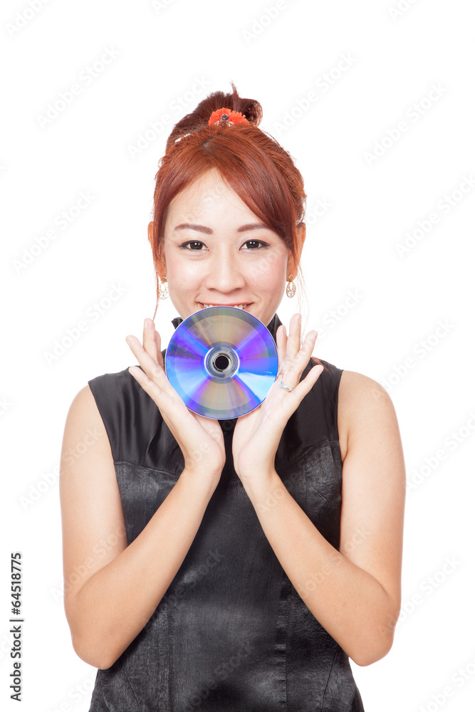 Fototapeta premium Asian girl show a disc with her both hands