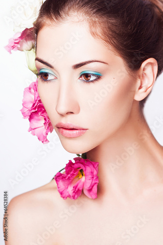 Fashion Beauty Model Girl with Flowers Hair. Bride