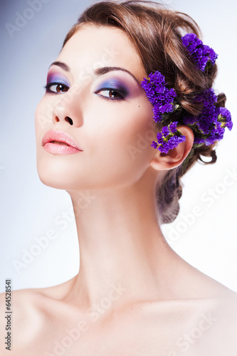 Fashion Beauty Model Girl with Flowers Hair. Bride. Perfect
