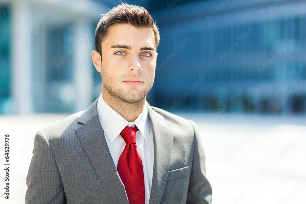 Very handsome businessman in an urban setting Very handsome businessman in an urban setting