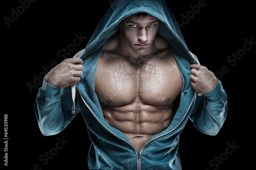 Strong Athletic Man Fitness Model Torso showing six pack abs. is photo
