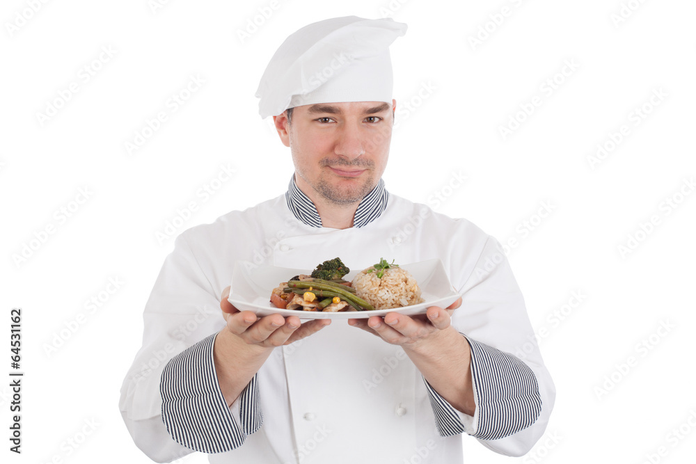 Chef showing and holding a plate of prepared food Chef showing and holding a plate of prepared food