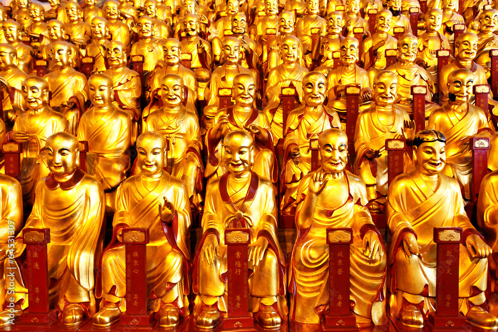 Fototapeta premium Gold statues of the Lohans