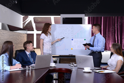 Business people working in ...