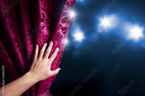 Theater curtain with dramatic lighting photo