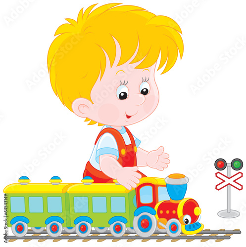 Child playing with a train