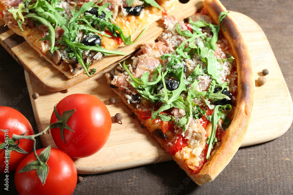 Piece of pizza with arugula Piece of pizza with arugula