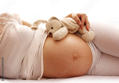 stomach pregnant woman on white background