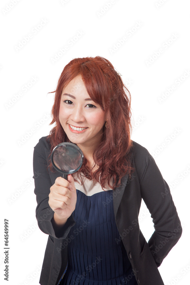 Asian office girl hold magnifying glass in front of her and smil Asian office girl hold magnifying glass in front of her and smil