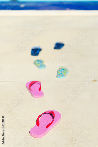 Flip flops at swimming pool