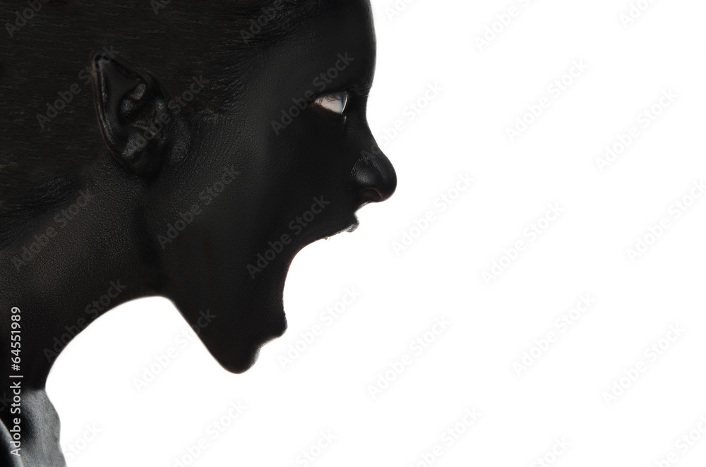 Fototapeta premium Screaming woman in black paint on white