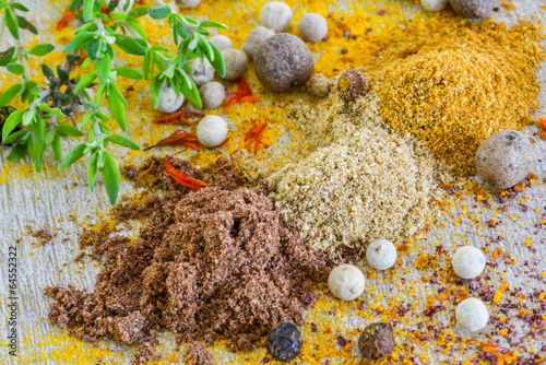 Various colorful spices, powders and herbs