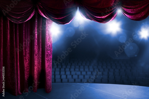Theater curtain with dramatic lighting photo