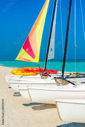 Colorful sailing boats on a tropical cuban beach