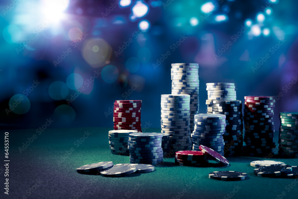 Fototapeta premium Casino chips with dramatic lighting and lens flares