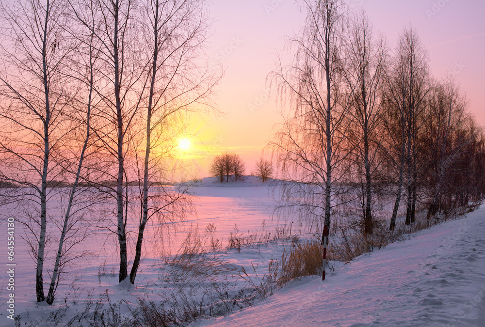 Beautiful winter sunrise in the village