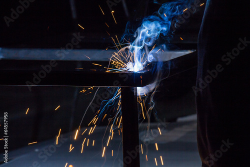 worker are welding steel