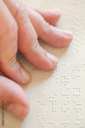 Blind reading text in braille language