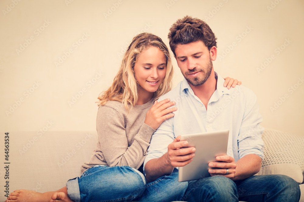 Young couple using tablet computer Young couple using tablet computer