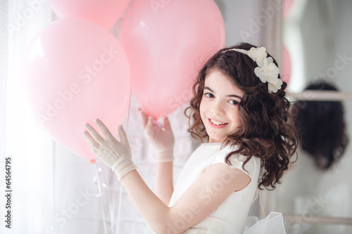 Fotografía niña con globos
