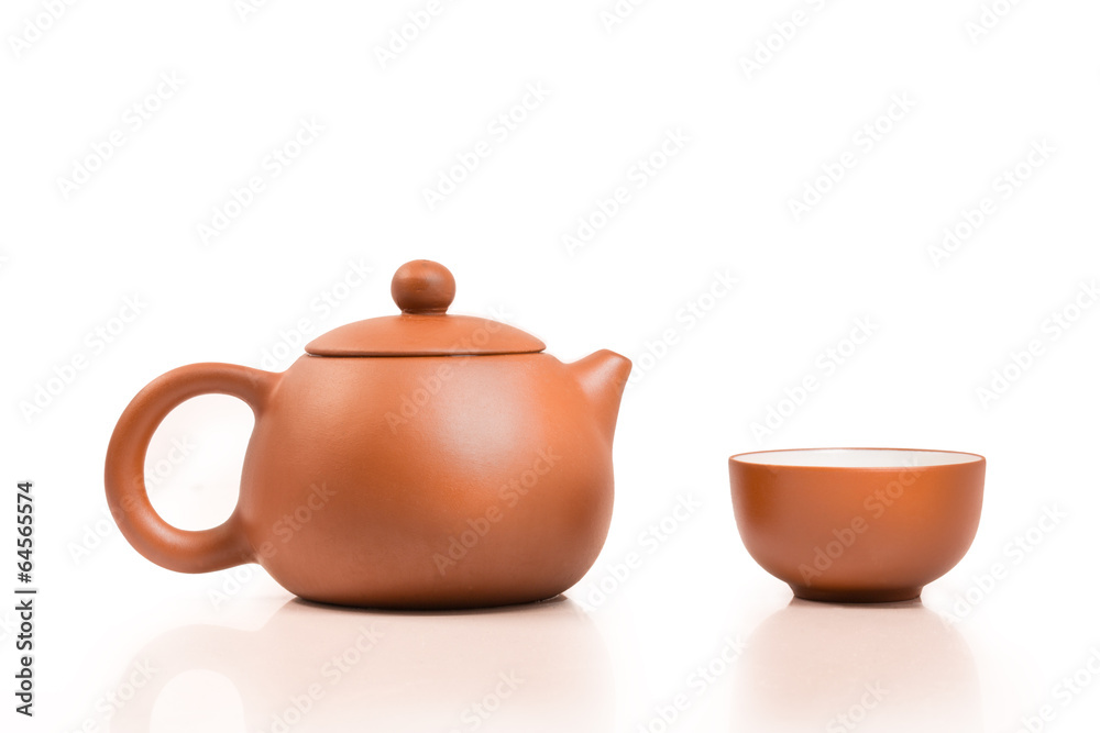 Tea cups with teapot on isolated on white background Tea cups with teapot on isolated on white background