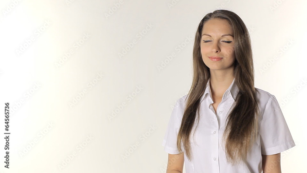 Girl shows on the information on a white background Girl shows on the information on a white background