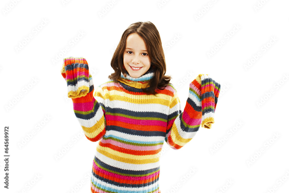 Portrait of a cute little girl in a striped sweater Portrait of a cute little girl in a striped sweater