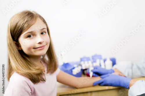 Photos Allergy - skin prick tests, cute girl in a laboratory