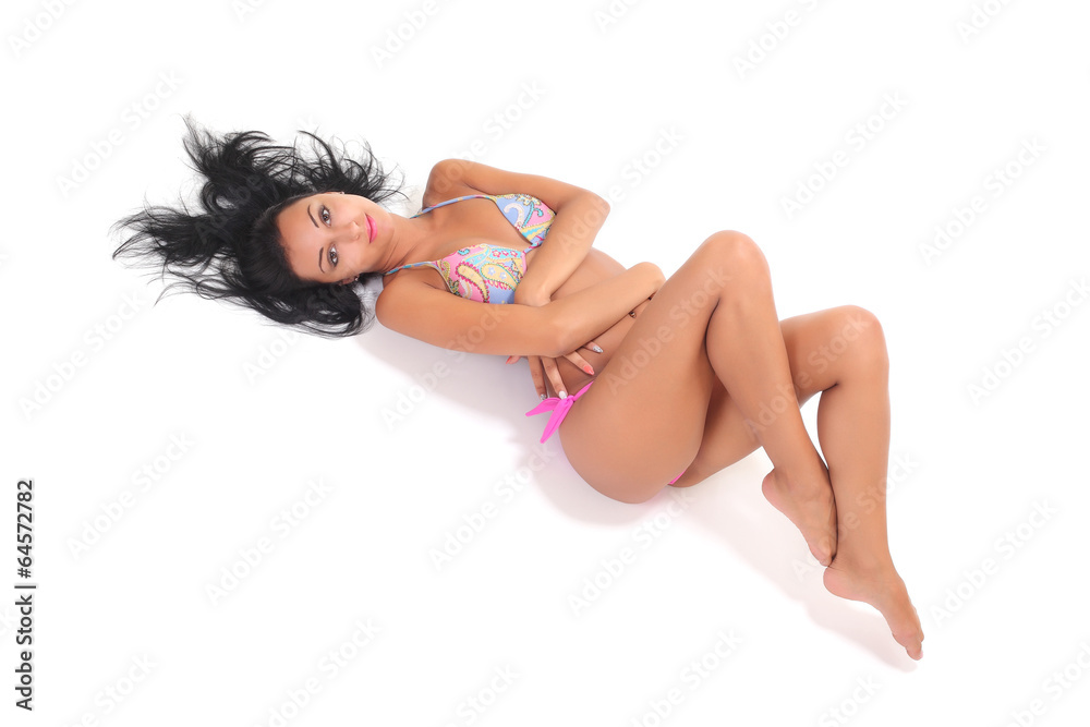 Sexy tan woman in bikini isolated on white background Sexy tan woman in bikini isolated on white background