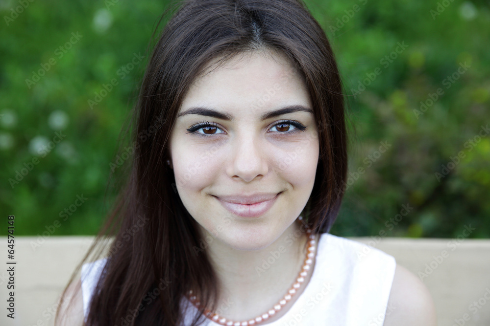 Portrait of a attractive happy woman outdoors Portrait of a attractive happy woman outdoors