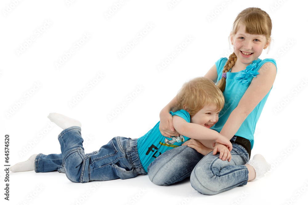Two children playing on white Two children playing on white
