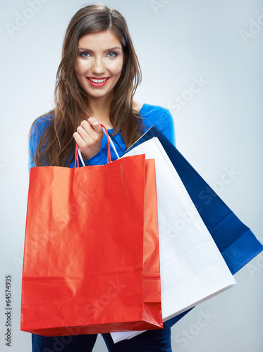  Portrait of happy smiling woman hold shopping bag. Female mode