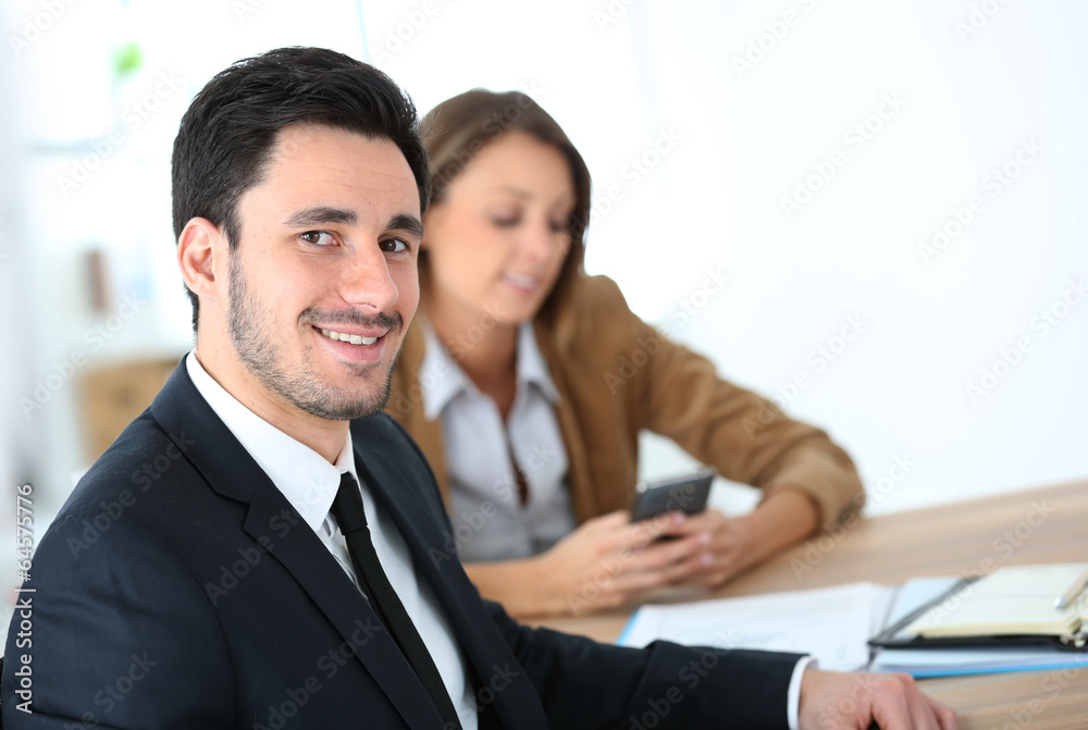 Portrait of smiling businessman having a meeting Portrait of smiling businessman having a meeting