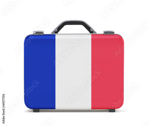 Business suitcase for travel with flag of French photo