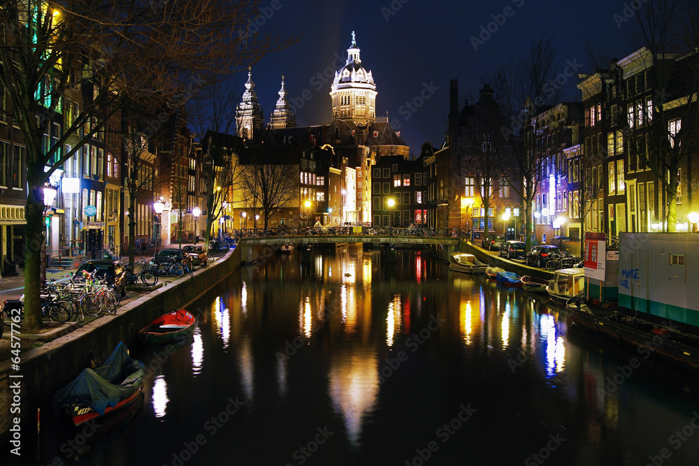 Evening view on the St. Nicolas Church in Amsterdam