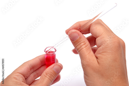 People working in laboratory with test tubes