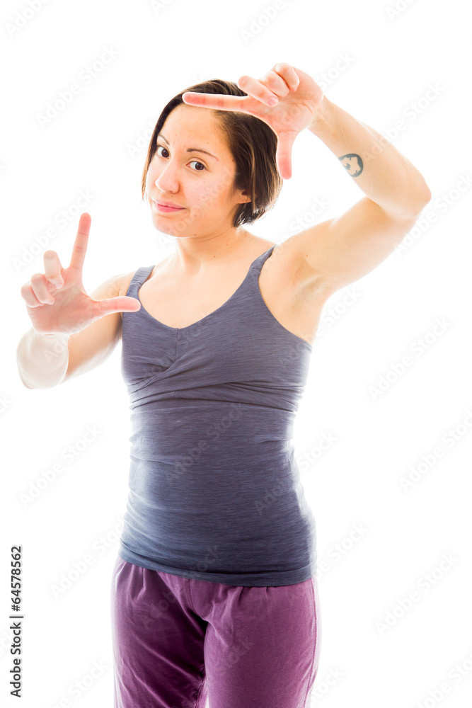 Young woman making frame with fingers