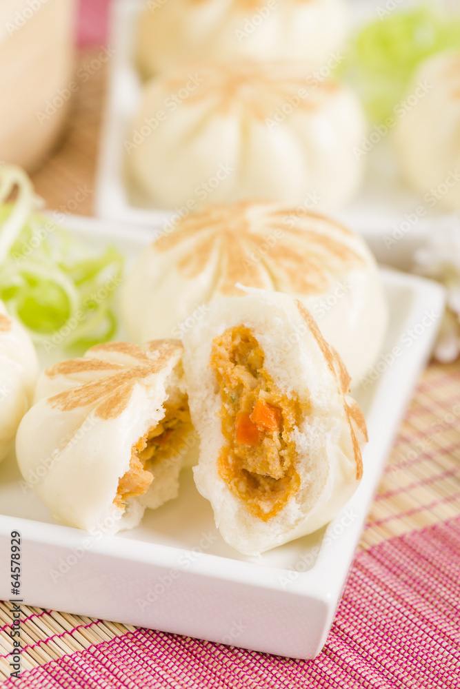 Salapao - Thai steamed buns filled with chicken.