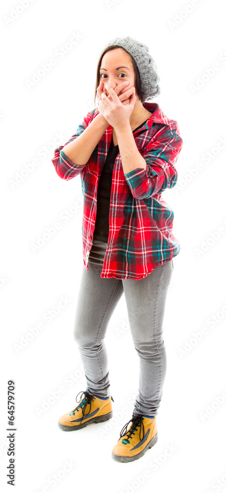 Young woman with hand over her mouth and shock Young woman with hand over her mouth and shock
