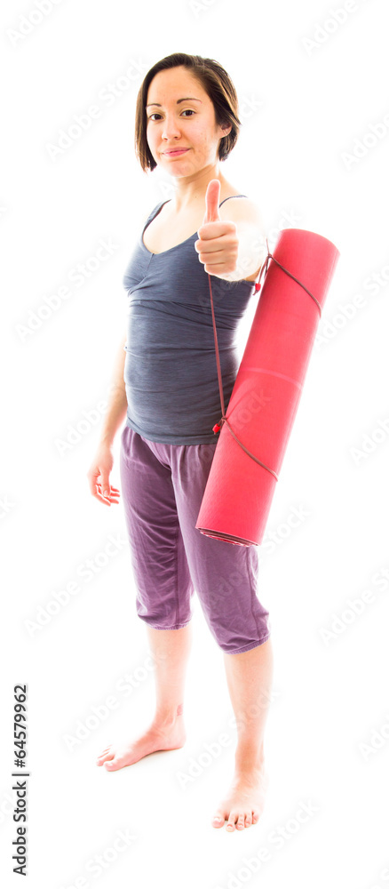 Fototapeta premium Young woman showing thumbs up sign